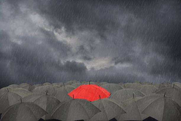 istock Umbrellas in the rain 1138255142