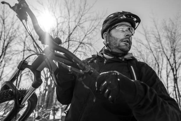 portrait of caucasian man biking - ontario spring bicycle city life imagens e fotografias de stock