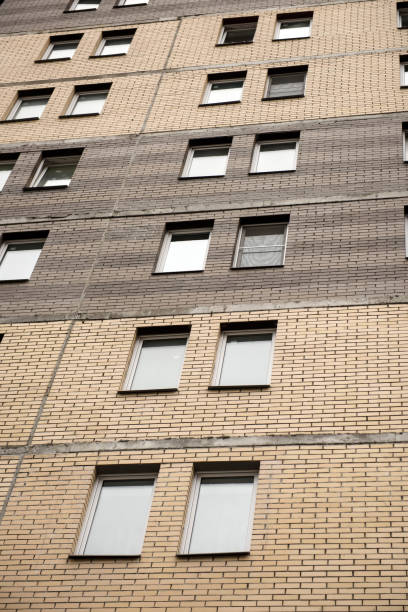 istock Wall of a multi-storey building under construction. 1138256199