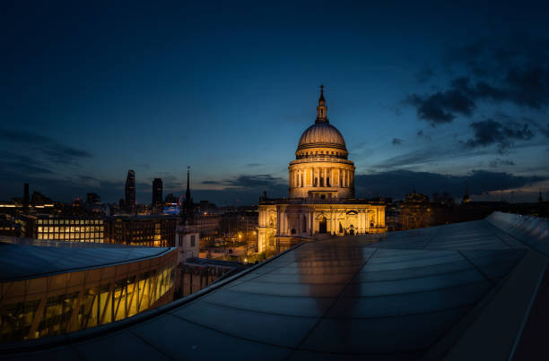 Dramatic sunset over St Paul's Cathedral and London Eye