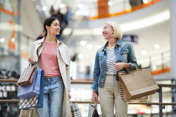 istock Cheerful women sharing expressions from shopping 1138257304