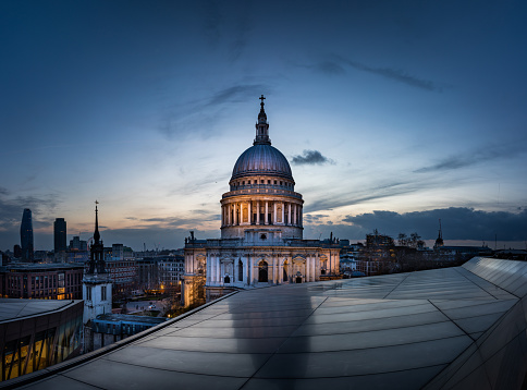 Dramatic sunset over St Paul's Cathedral and London Eye. Extreme high resolution image quality