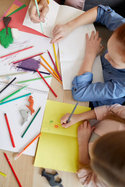 istock Girls Making Handmade Cards 1138257808
