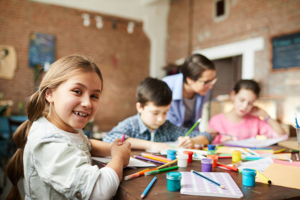 Little Girl Having Fun in Art Class