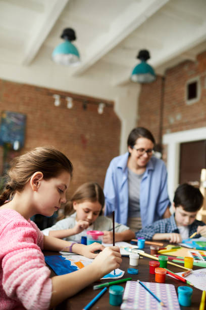istock Children painting in Art Class 1138260057