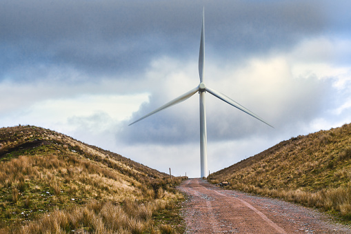 Wind turbines are highly efficient in generating clean renewable energy.  Harnessing wind power and converting it into electricity.  They are used by many countries as part of a strategy to reduce their reliance on fossil fuels.  The location here is the Scottish Highlands, where as of 2018, 100% of the nations electricity demands were met using wind power.