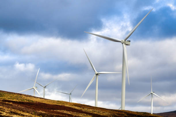 istock Wind Turbine generating renewable energy on hilltop 1138263262