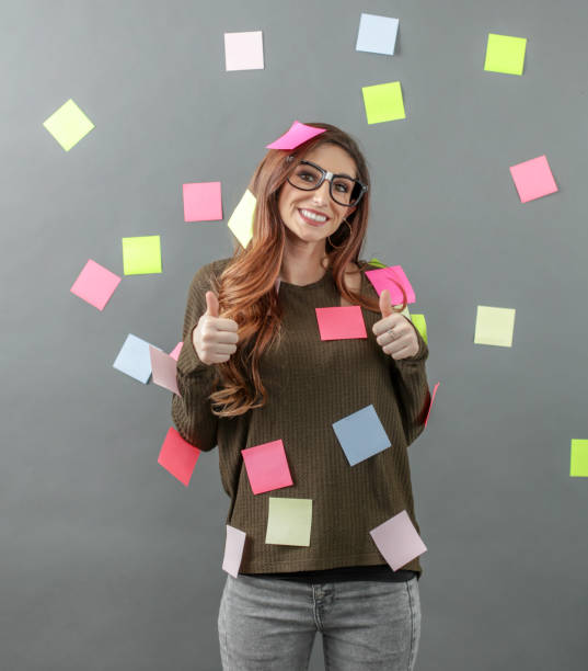 istock Woman with sticky notes posted all over her and background 1138264766