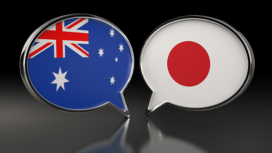 Australia and Japan flags with Speech Bubbles. 3D Illustration