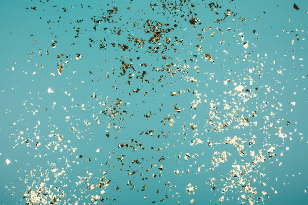 istock Golden sparkles on trendy background. 1138267146