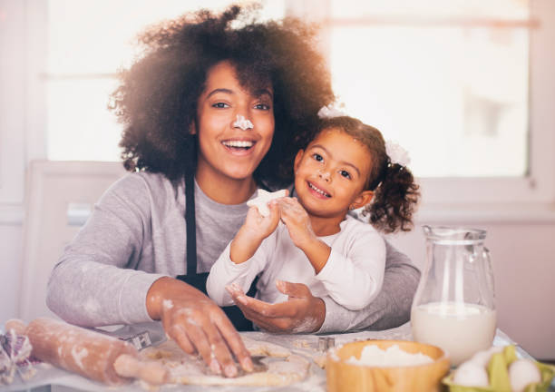 istock Mother and daughter are baking together 1138269321