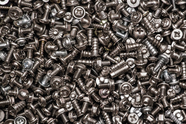 istock Silvery and shiny bolts and screws 1138272516