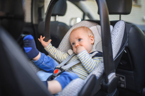 istock Baby boy in a car safety seat 1138274724