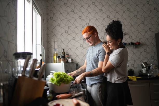 Couple cooking together at home