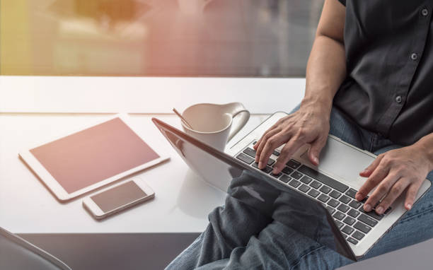 istock Digital communication lifestyle blog writer person using mobile smart device, or woman user typing on computer laptop working online via wireless internet technology 1138281271