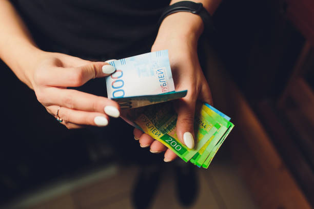 istock Russian roubles and some new 200 and 2000 roubles bills. 1138281807