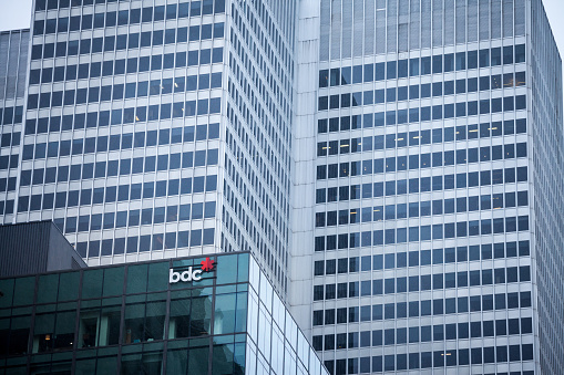 Picture of a sign with the logo of BDC Bank taken in front of their main office for Montreal, Quebec, Canada. The Business Development Bank of Canada is a federal Crown corporation wholly owned by the Government of Canada whose goal is to help create and develop Canadian businesses through financing, growth and transition capital, venture capital and advisory services, with a focus on small and medium-sized enterprises