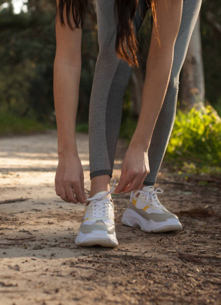 istock woman running at park 1138288530