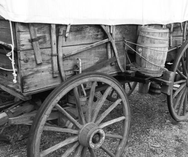 istock Black & White Shot of Old Wagon Wheel 1138289639