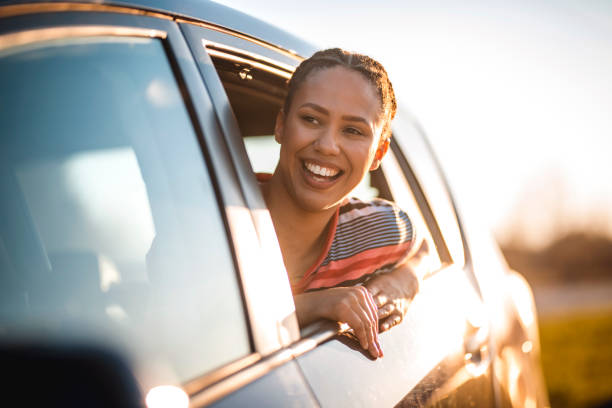 istock Woman looking out from the car 1138300083