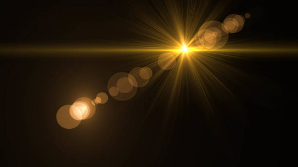 istock Lens flare  glow light effect  on black background. Easy to add overlay or screen filter over photos 1138302928