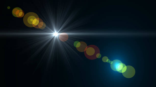 istock Lens flare  glow light effect  on black background. Easy to add overlay or screen filter over photos 1138302932