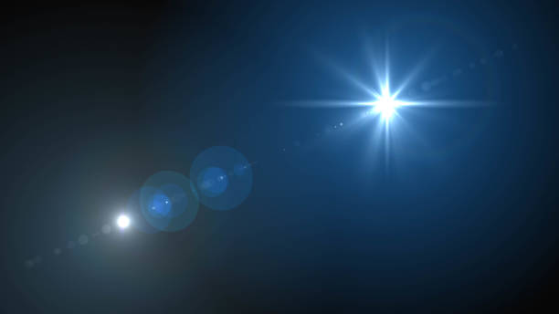 istock Lens flare  glow light effect  on black background. Easy to add overlay or screen filter over photos 1138302941
