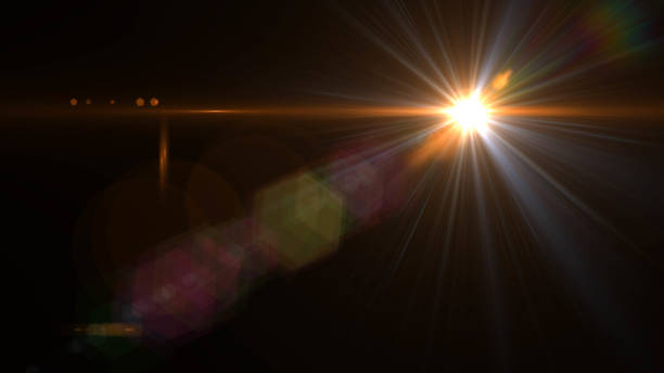 istock Lens flare  glow light effect  on black background. Easy to add overlay or screen filter over photos 1138302977