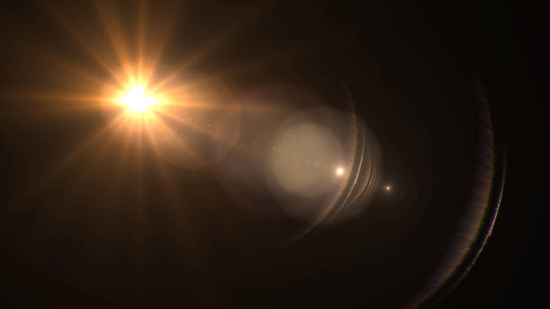 istock Lens flare  glow light effect  on black background. Easy to add overlay or screen filter over photos 1138302982