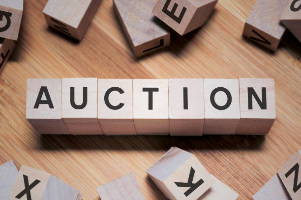 istock AUCTION Word In Wooden Cube 1138304548