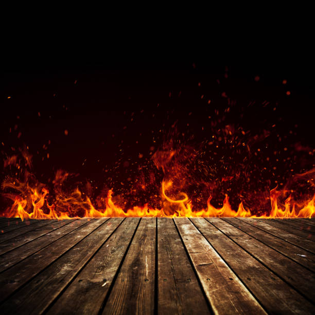 огонь пламя изолированы на черном - red hot стоковые фото и изображения