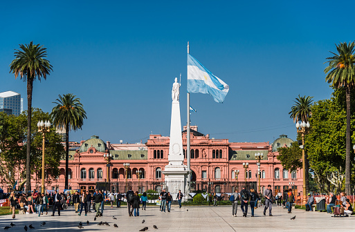 Buenos Aires, Argentina - March 21, 2019: Casa Rosada presidential palace building with big Argentina flag on a sunny day