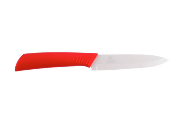 istock Red ceramic knife isolated on the white background 1138318206