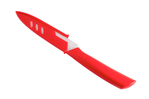 istock Red ceramic knife isolated on the white background 1138318207