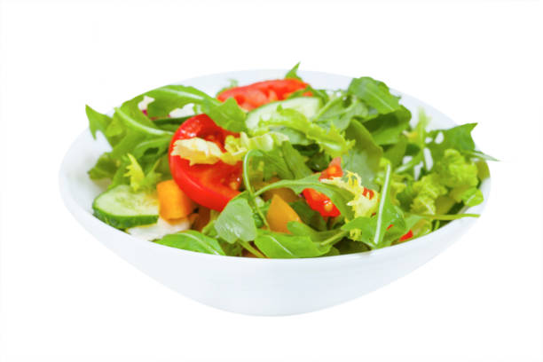 istock Fresh vegetable salad  in plate, isolated 1138318798