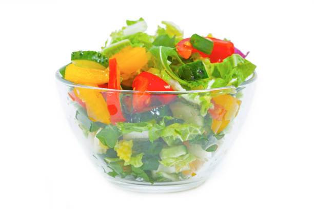 istock Fresh vegetable salad  in plate, isolated 1138318812