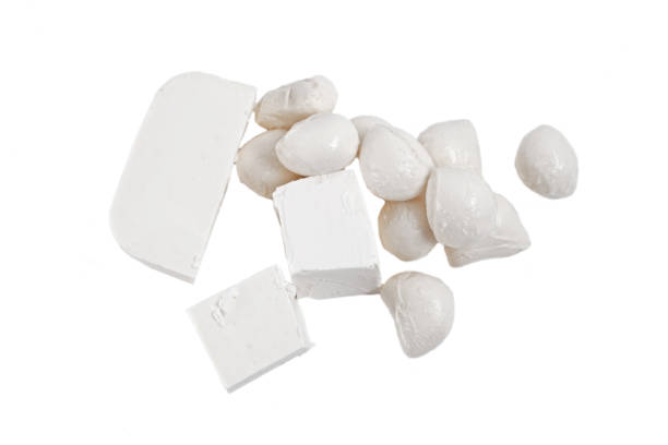 istock White cheese isolated on the white background 1138318989