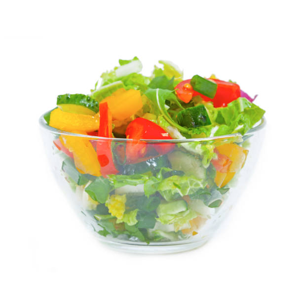 istock Fresh vegetable salad  in plate, isolated 1138322532