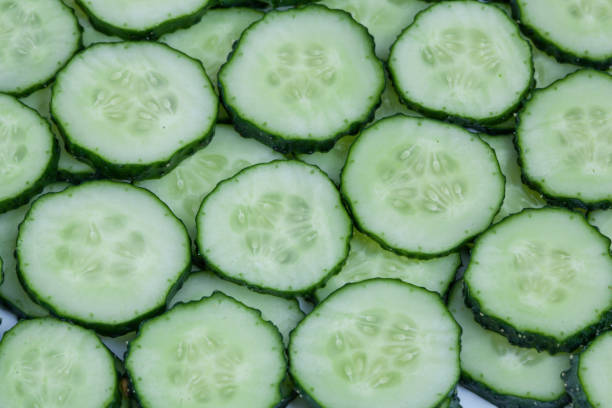 istock Fresh green cucumber background - healthy food 1138325292