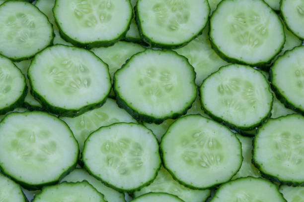 istock Fresh green cucumber background - healthy food 1138325556