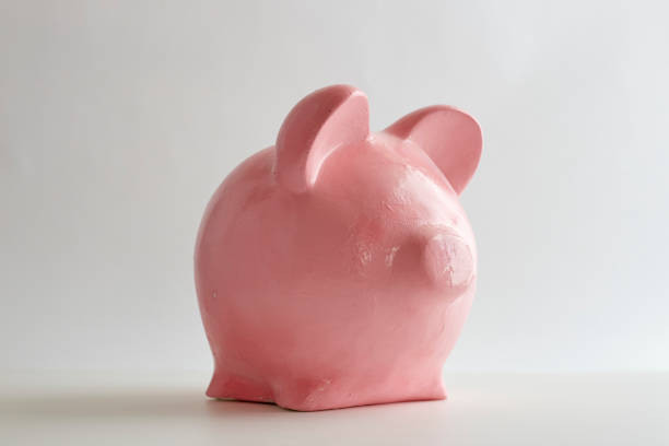 istock Pink piggy bank on a white studio background 1138325771