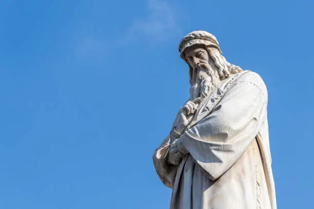 Photo of Leonardo Da Vinci Statue on Blue Sky Closeup in Milan