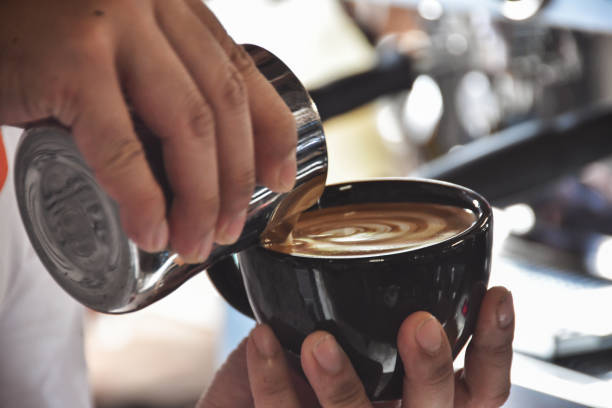 istock hand of barista making coffee 1138327001
