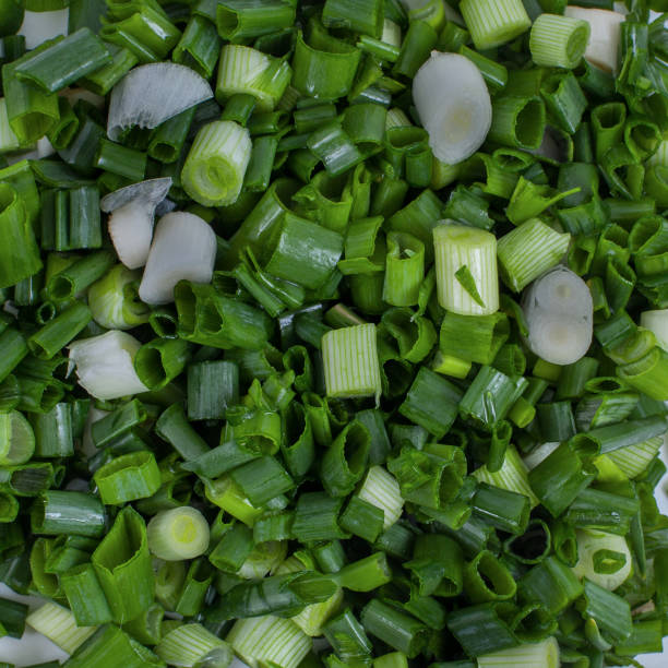 istock Chopped young green onion, background 1138327248