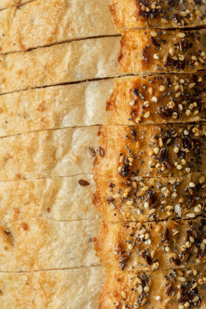 istock Sliced Loaf Wheat Bread Seeds Bread Bakery background Set bread 1138328395