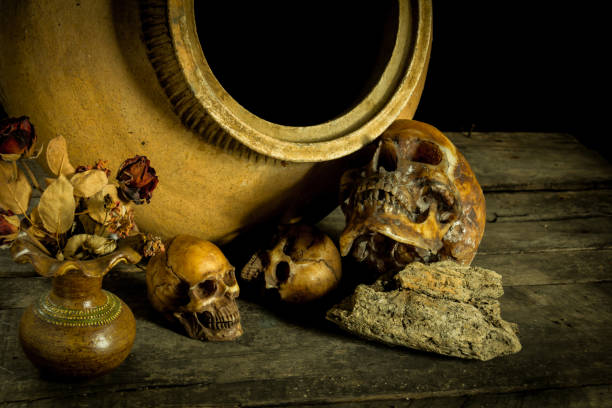 istock Still Life with Skull and clay pot,earthenware background 1138328605