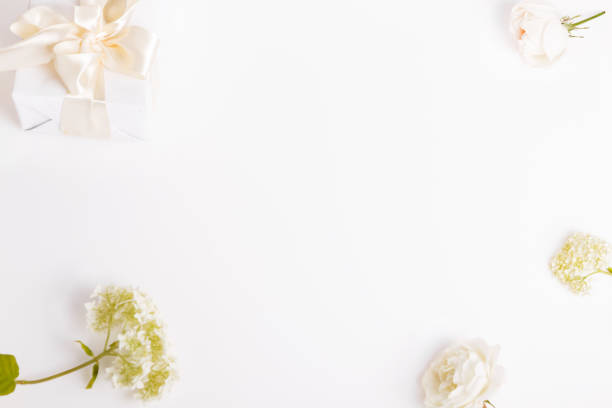 istock Festive flower composition on the white background. Overhead view 1138332769