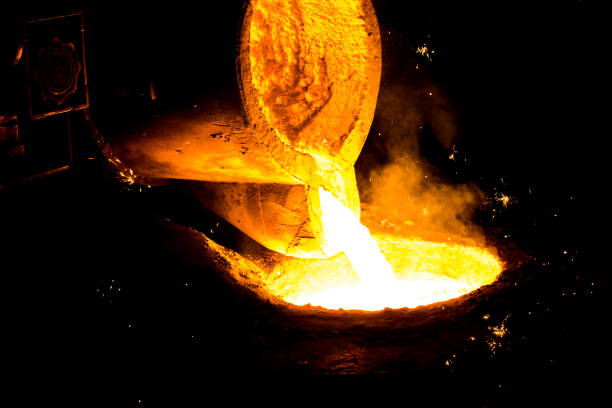 istock metal casting process with red high temperature fire in metal part factory 1138333923