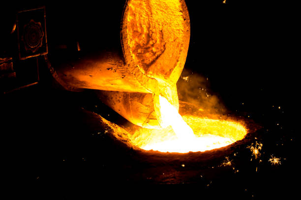 istock metal casting process with red high temperature fire in metal part factory 1138333924