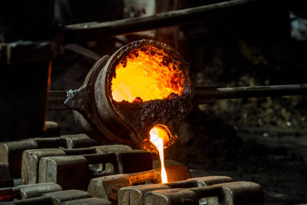 istock metal casting process with red high temperature fire in metal part factory 1138333935